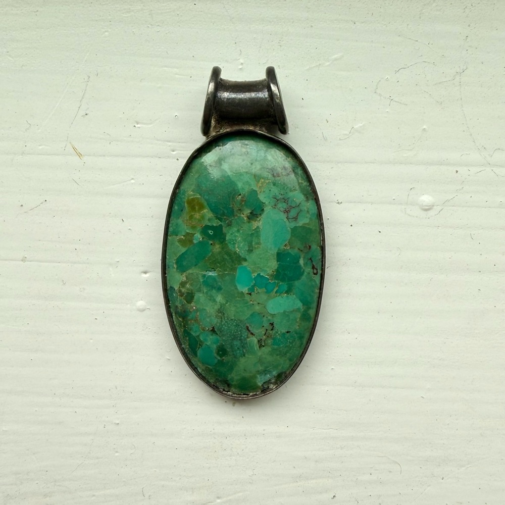 Lovely green blue stone pendant set in silver